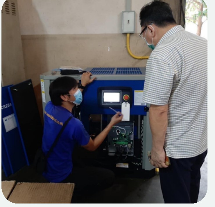 World Prod technician inspecting an air compressor